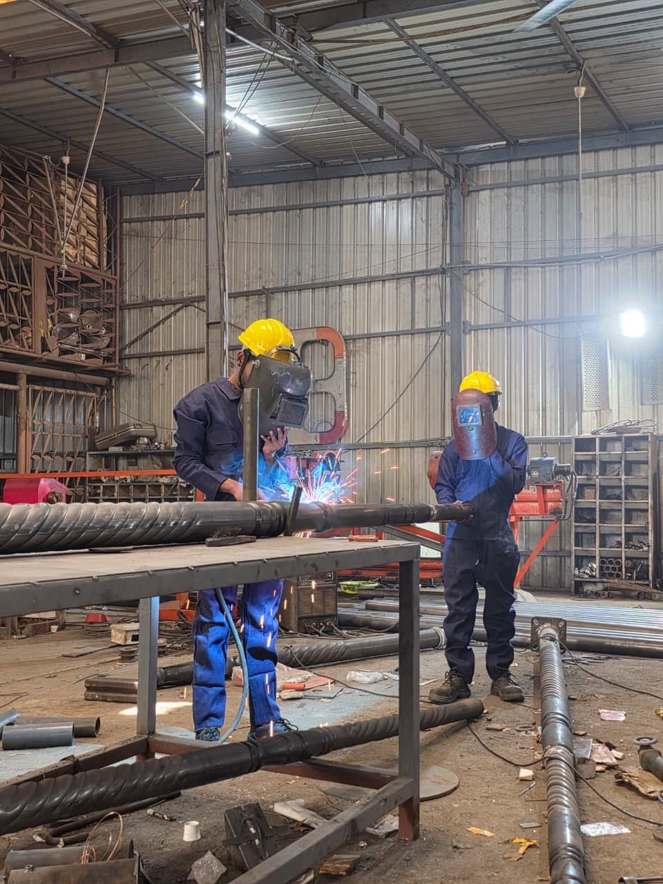 Spiral pole seam welding